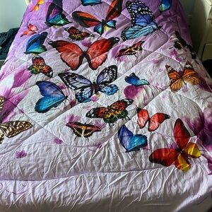 Purple and Red Comforter with Vibrant Butterfly Design
